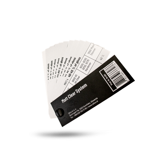 A set of swatch cards fanned out behind a black header card labeled 'Matt Clear System' with a barcode and company details, shown on a clean white background.